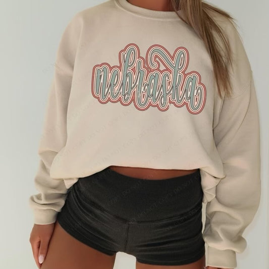 Nebraska Boho Scroll Stacked Distressed Crewneck